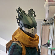 Dark Deku helmet worn with a mustard scarf, original photo