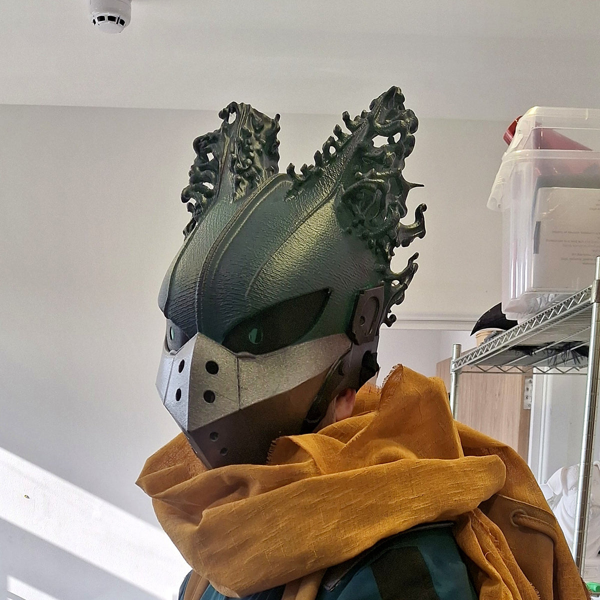 Dark Deku helmet worn, front three-quarter view, original photo