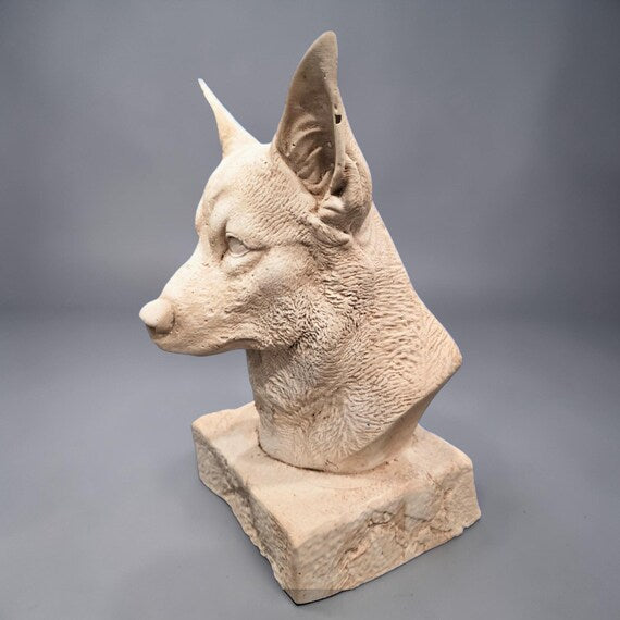 Corgi stone-style sculpture detail